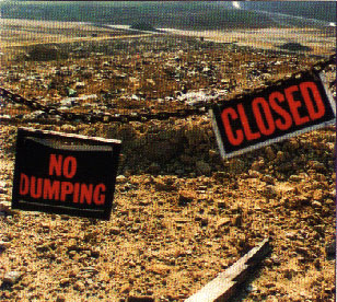 industrial waste showing sign that says no dumping